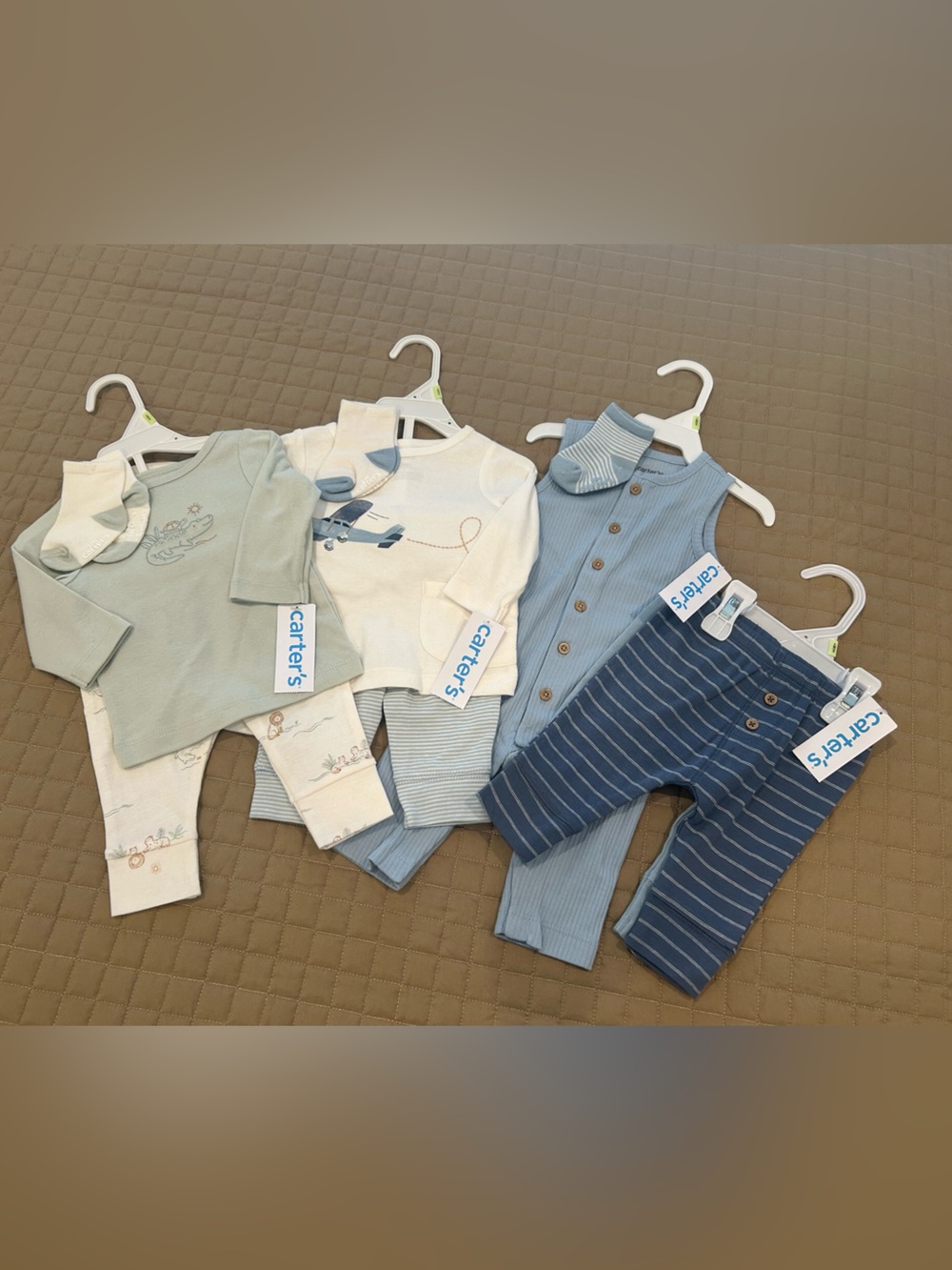 4 Carter's baby sets/outfits